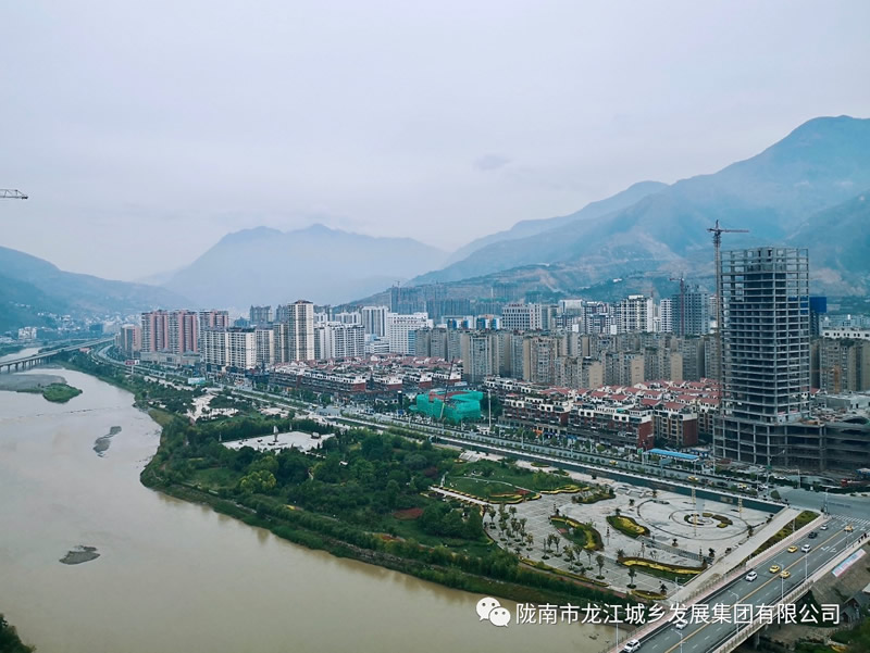 匠心傾注、喜封金頂——龍江?雙子座商住小區主體順利封頂